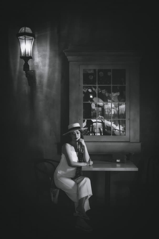 Pensive Woman At Window by Jeff Wang — canvas wall art
