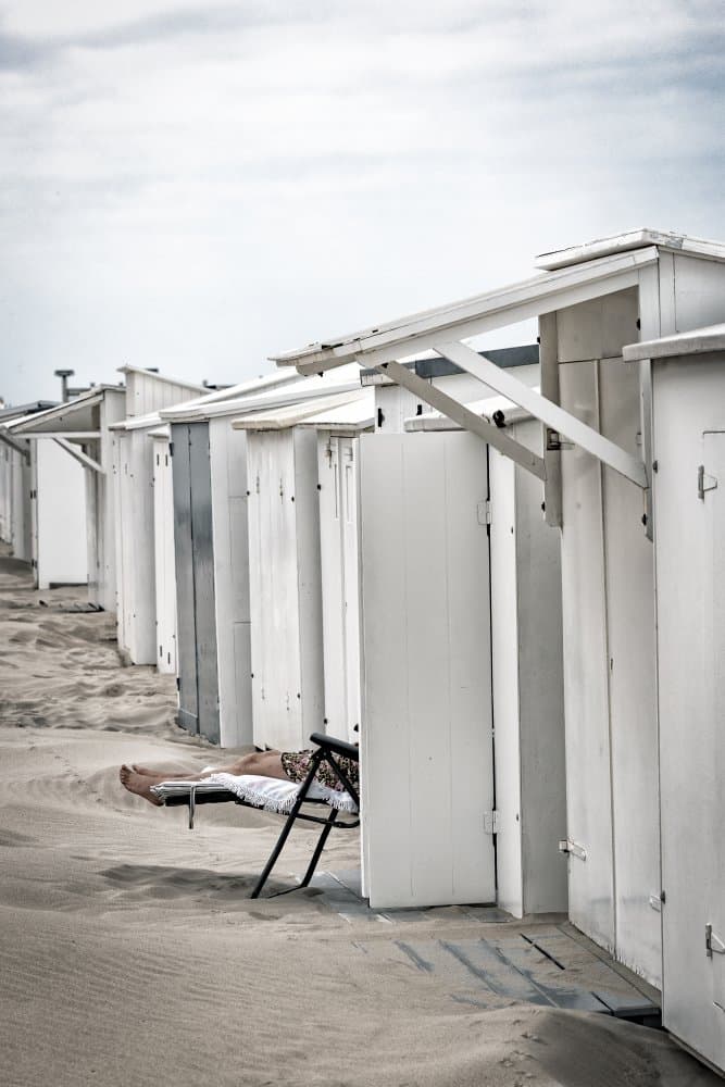 Tranquil Beach Huts by Peter Pfeiffer — canvas wall art