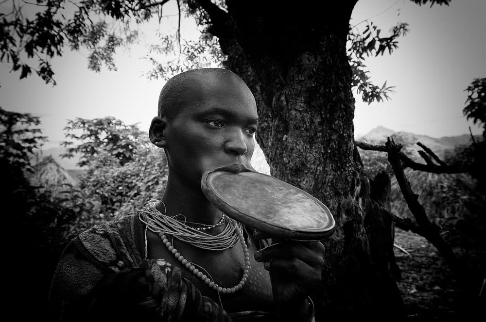 Contemplative Tribal Portrait by Trevor Cole — canvas wall art
