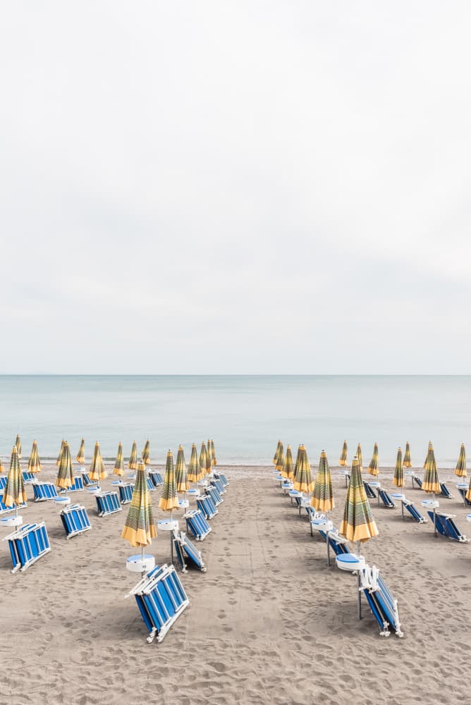 Empty Beach Umbrellas by Photolovers — canvas wall art