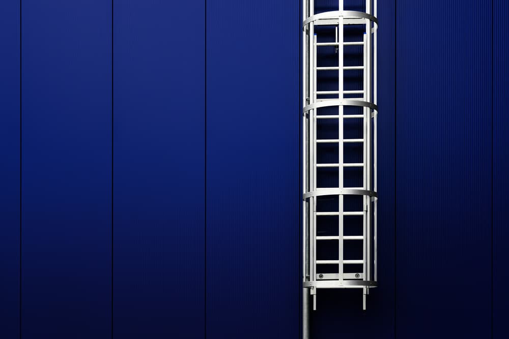 Blue Building Ladder by Marc Huybrighs — canvas wall art