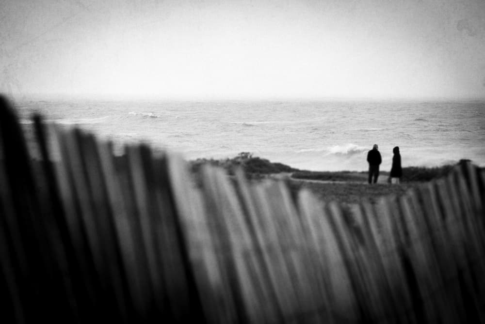 Coastal Couple Stroll by Milena Seita — canvas wall art