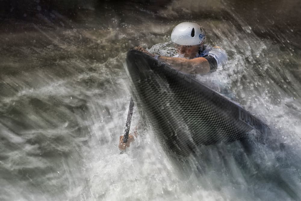 Kayak Through Rapids by Milan Malovrh — canvas wall art