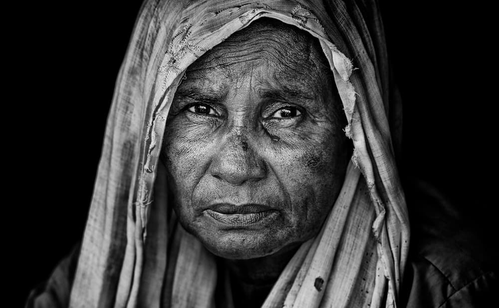 Pensive Elderly Woman by Joxe Inazio Kuesta Garmendia — canvas wall art