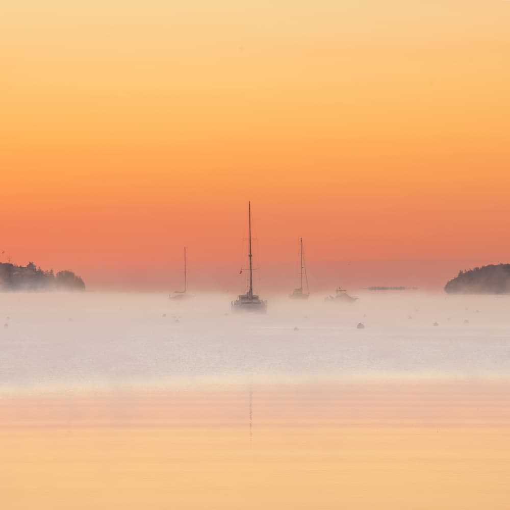 Misty Orange Sunrise by Ambar Saha — canvas wall art