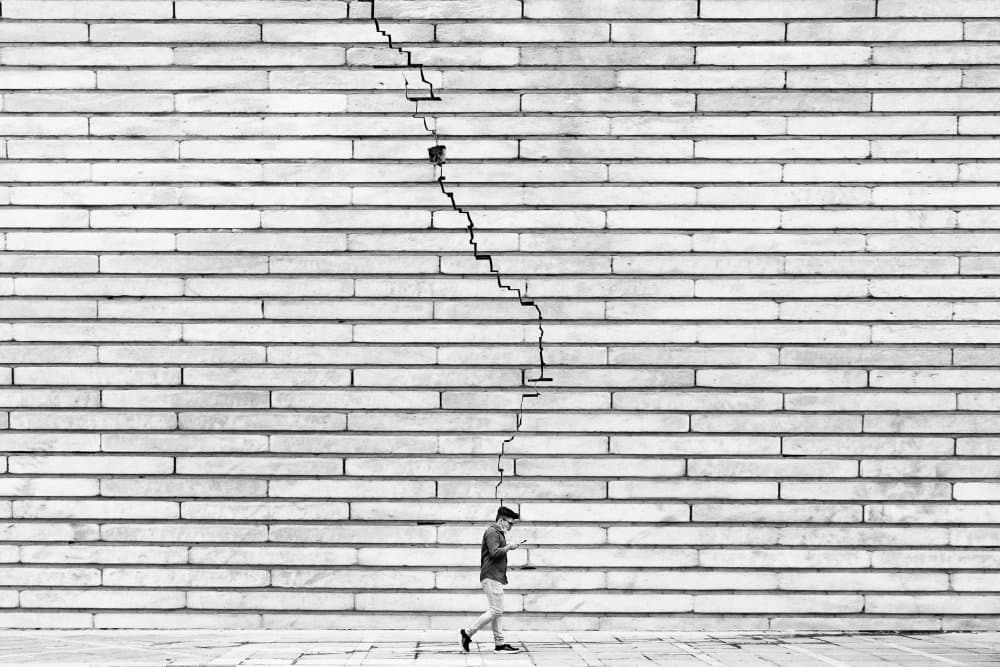 Man By Cracked Wall by Hamid Mohammad Hossein Zadeh Hashemi — canvas wall art