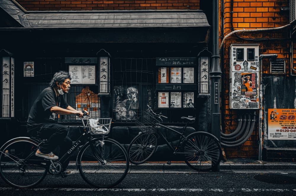 Tokyo Street Cyclist by Yuzo Fujii — canvas wall art