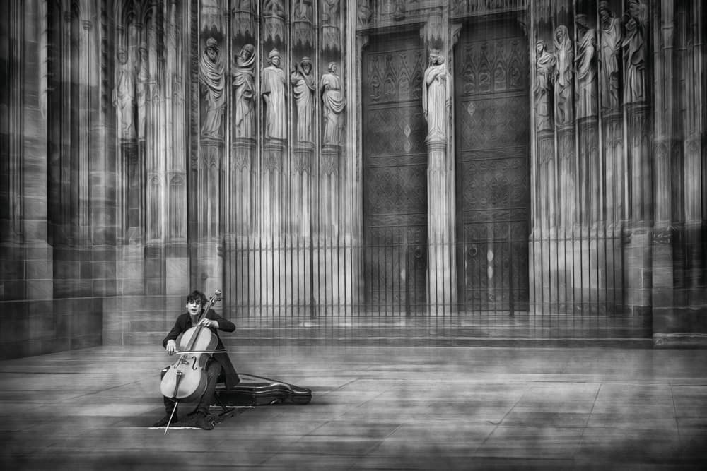 Cellist and Cathedral by Roswitha Schleicher-Schwarz — canvas wall art