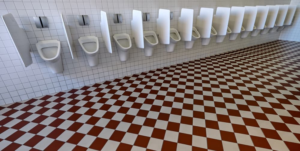 Checkered Restroom Urinals by Lus Joosten — canvas wall art
