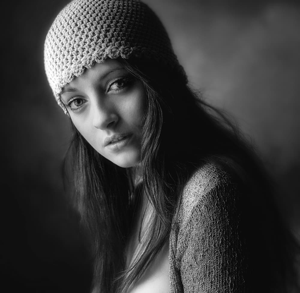 Pensive Woman In Beanie by kenp — canvas wall art