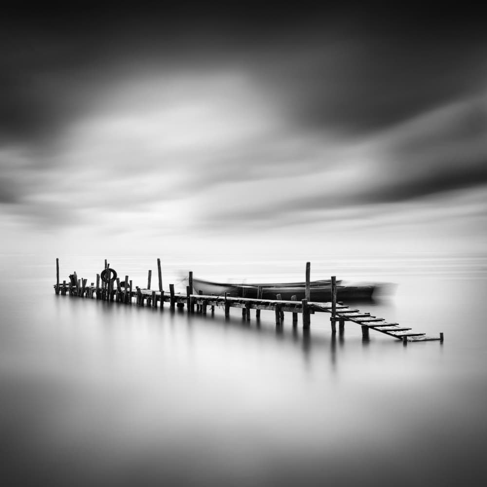 Serene Pier Boat by George Digalakis — canvas wall art