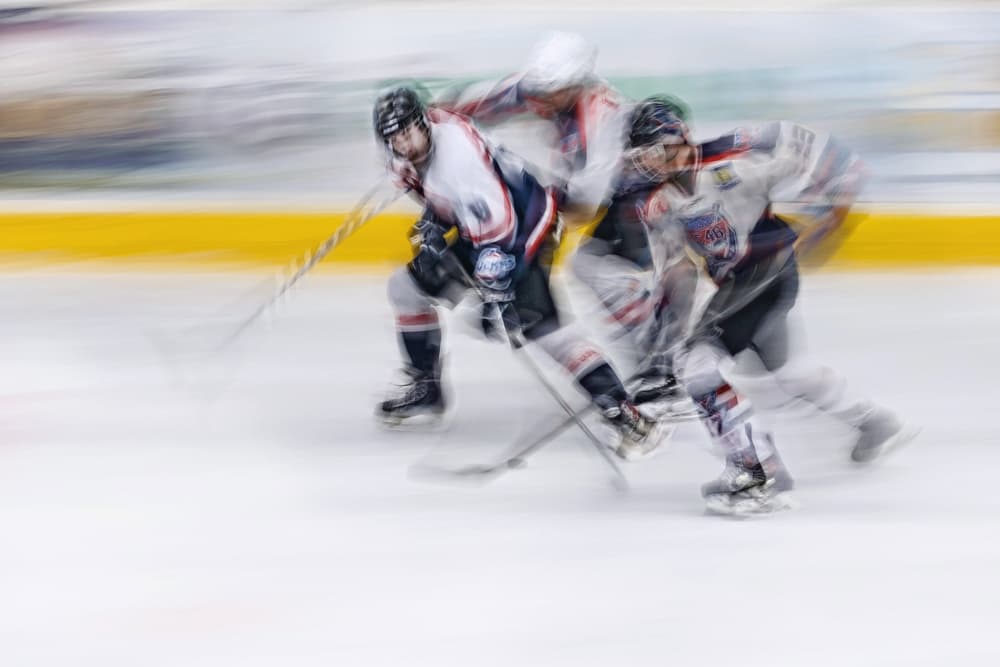Dynamic Hockey Action by Dusan Ignac — canvas wall art