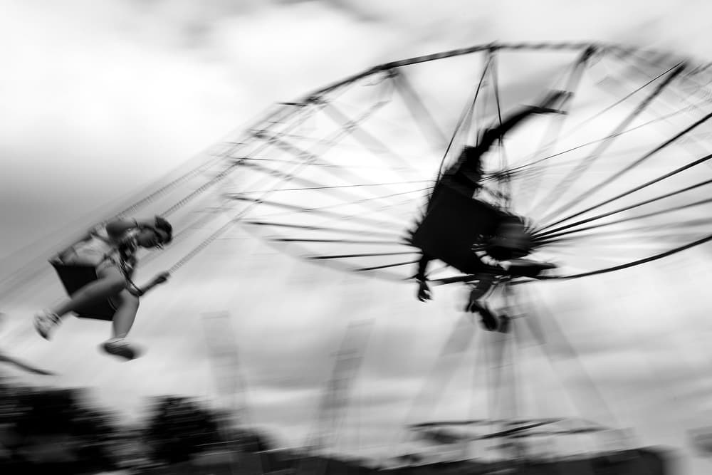 Motion Blur Swing Ride by Marius Cinteza — canvas wall art