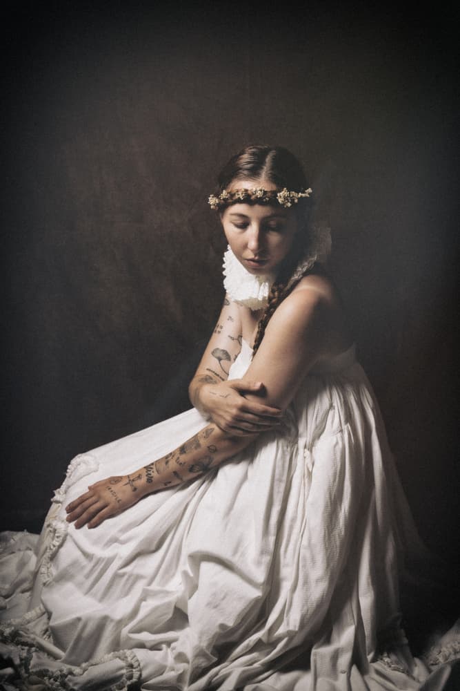 Pensive Woman with Flowers by Ruth Franke — canvas wall art