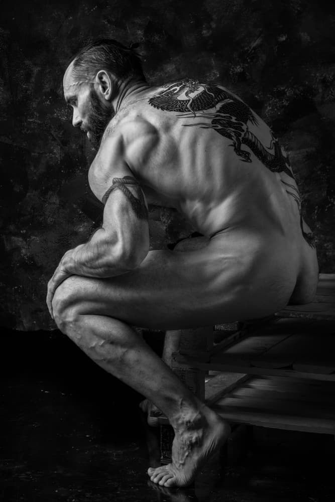 Contemplative Male Nude by AURIMAS VALEVICIUS — canvas wall art