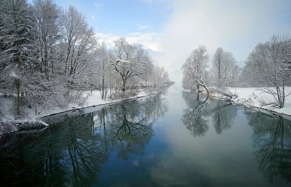 Winter River Reflections by Norbert Maier — canvas wall art