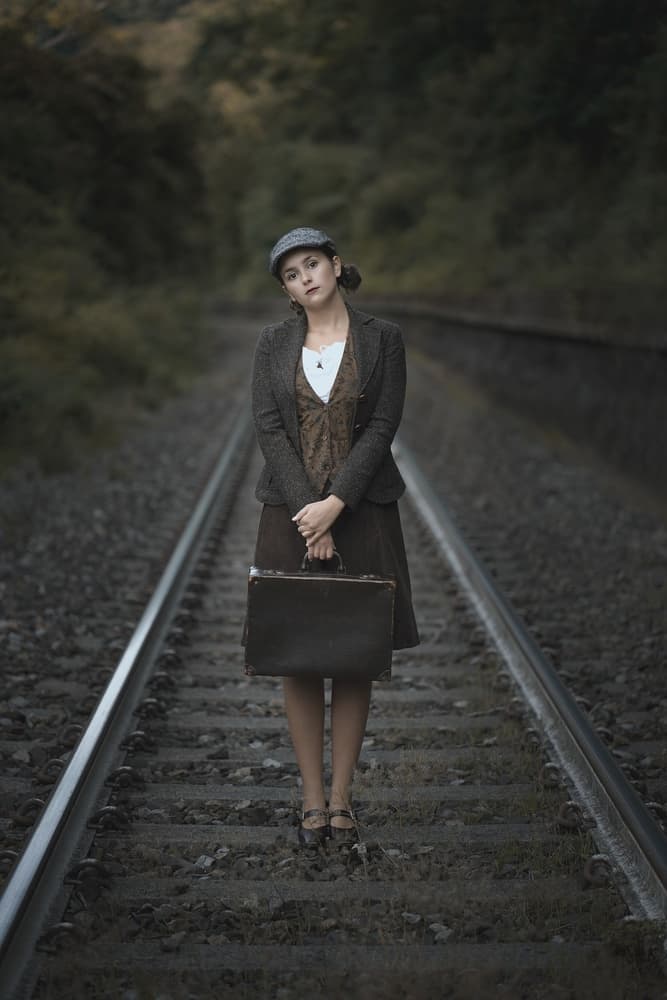 Pensive Woman On Tracks by Domenico Petrocca — canvas wall art