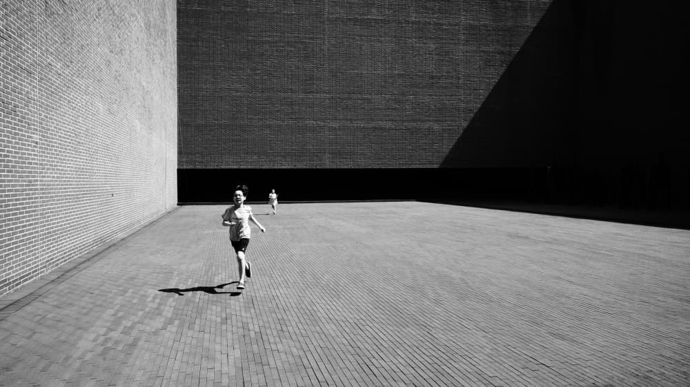 Child Running Shadowplay by Parole Kim — canvas wall art