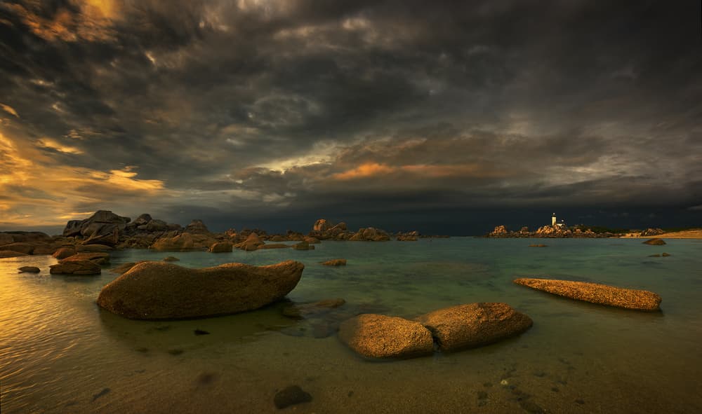 Dramatic Coastal Lighthouse by Krzysztof Browko — canvas wall art