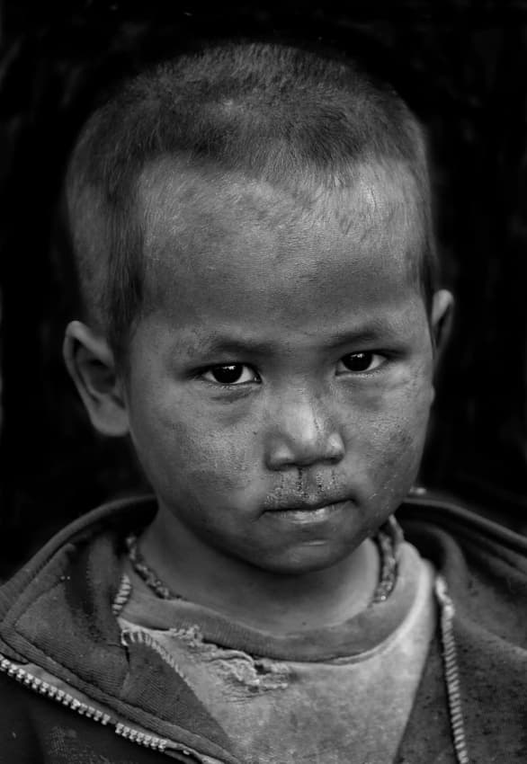 Boy's Intense Gaze by Yvette Depaepe — canvas wall art