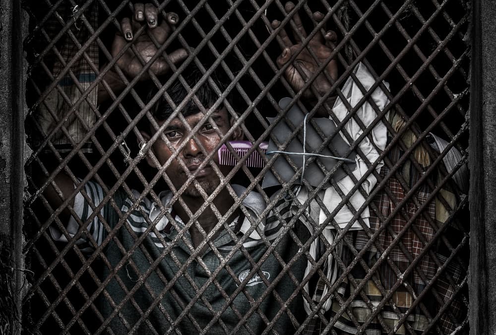 Dark Gaze Behind Grate by Joxe Inazio Kuesta Garmendia — canvas wall art
