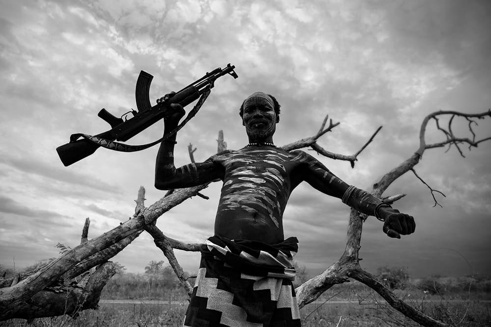 African Warrior With Rifle by Svetlin Yosifov — canvas wall art