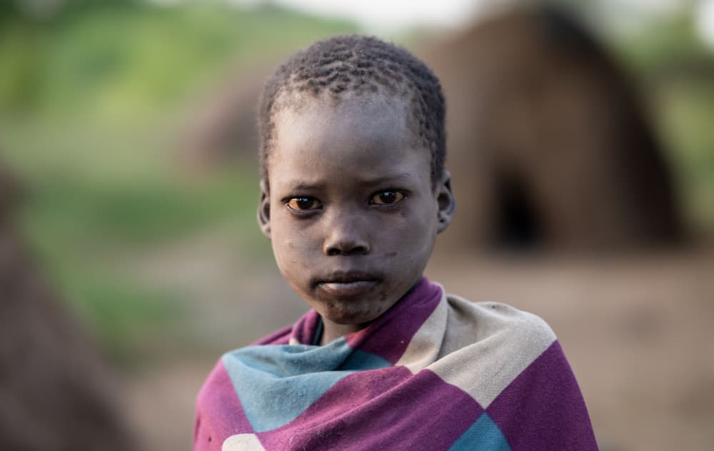 Young African Portrait by Hamza Qarooni — canvas wall art