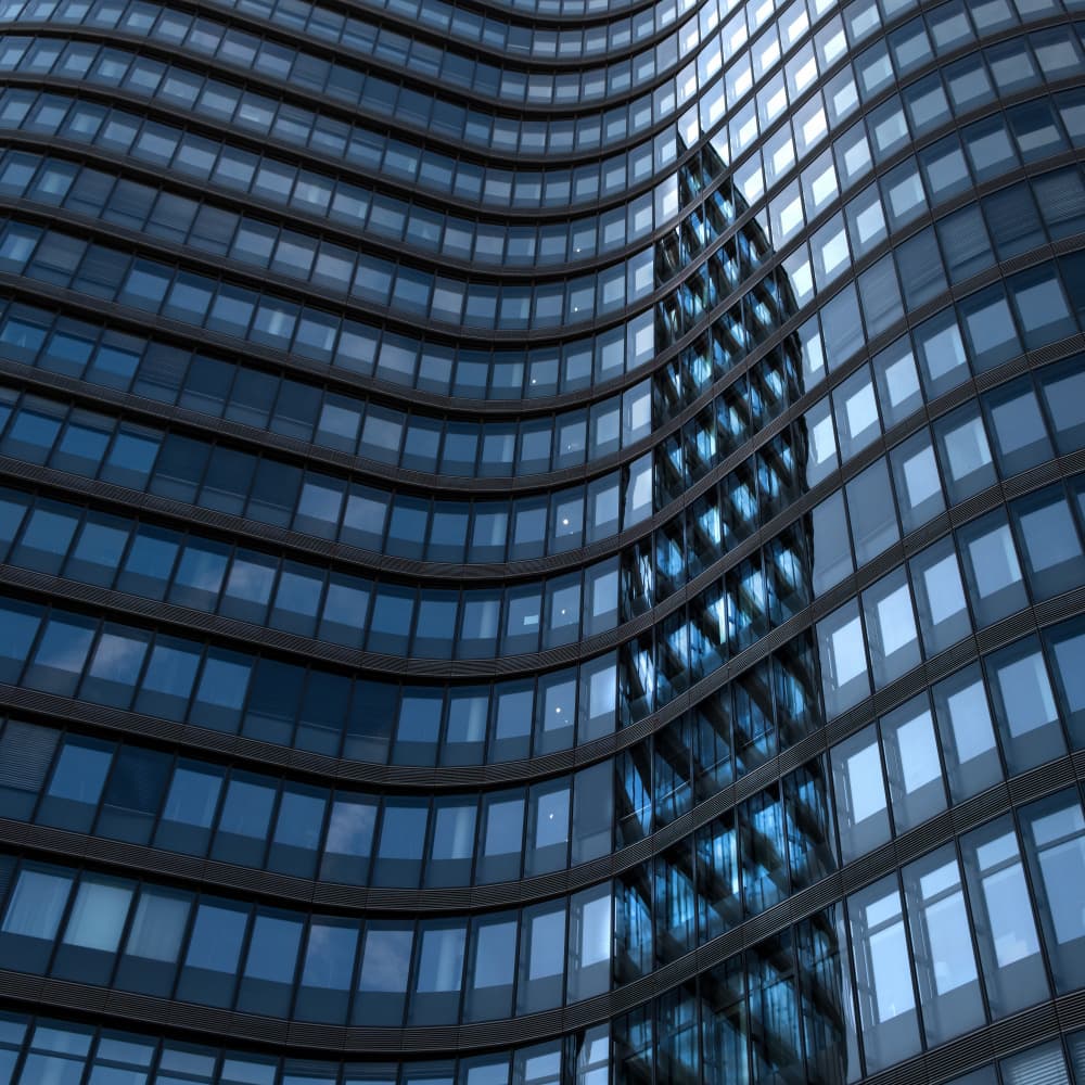 Curved Glass Building Reflection by Rolf Endermann — canvas wall art