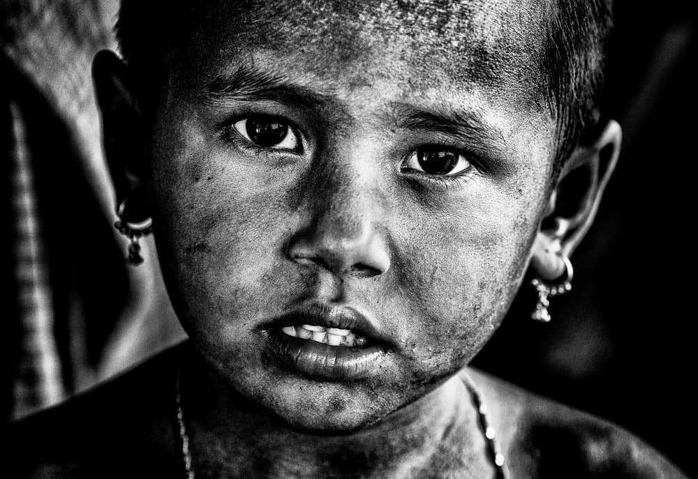 Solemn Child Portrait by Joxe Inazio Kuesta Garmendia — canvas wall art