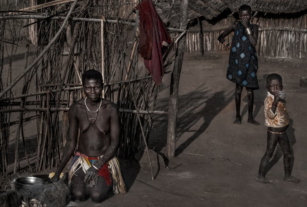 African Village Family by Joxe Inazio Kuesta Garmendia — canvas wall art