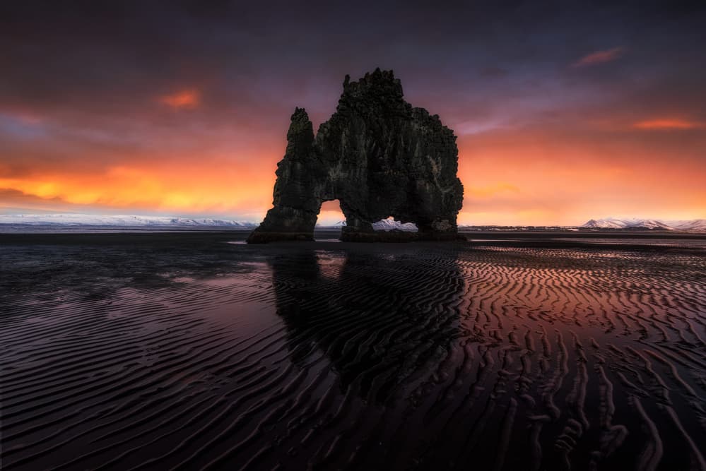 Icelandic Sea Stack Sunset by David Martin Castan — canvas wall art