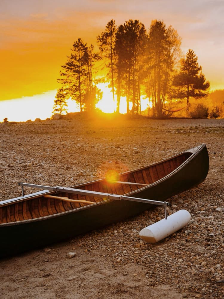 Golden Sunset Canoe by Del Mundo Imagery — canvas wall art