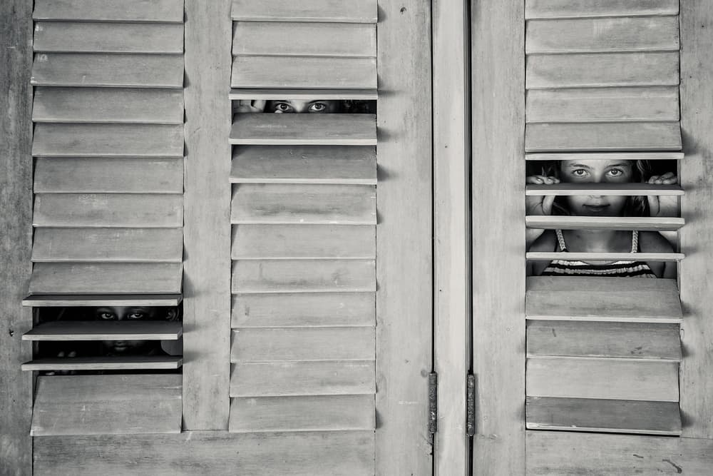 Curious Children Peeking by Gloria Salgado Gispert — canvas wall art
