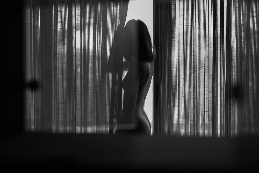 Intimate Window Silhouette by Thanakorn Chai Telan — canvas wall art