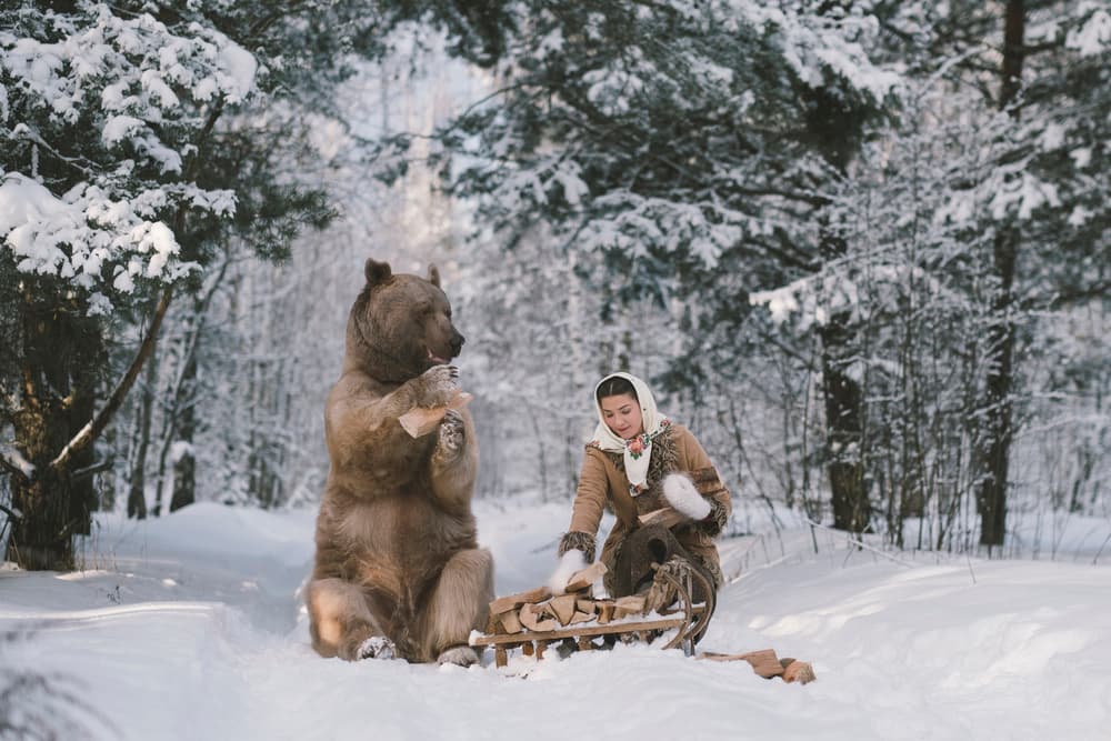 Woman and Bear in Winter by Olga Barantseva — canvas wall art