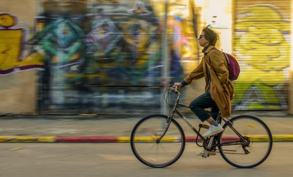 Street Art Cyclist by Itzik Einhorn — canvas wall art