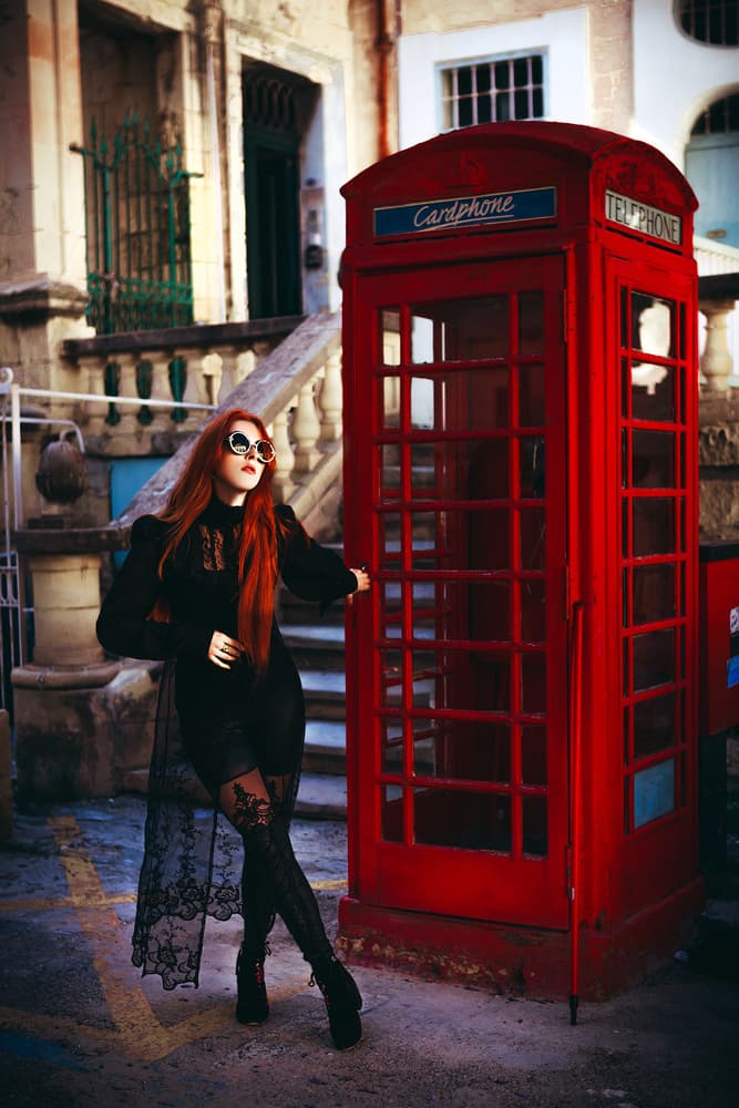Red Hair Red Booth by Ruslan Bolgov — canvas wall art