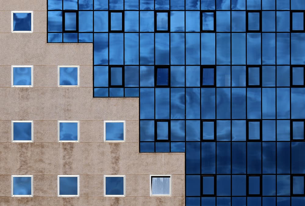 Geometric Blue Facade by Hans-Wolfgang Hawerkamp — canvas wall art