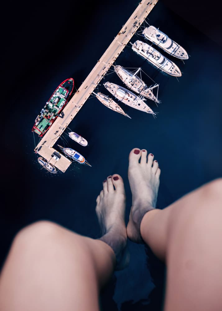 Relaxing Feet Over Water by Ariz Rab — canvas wall art