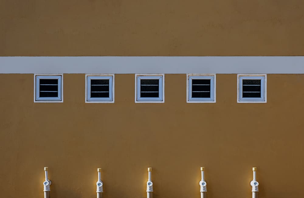 Minimalist Yellow Facade by Rolf Endermann — canvas wall art