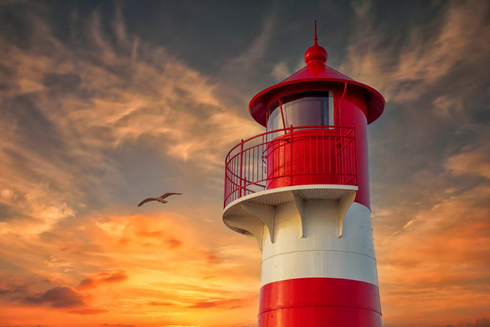 Lighthouse Sunset Flight by Leif Løndal — canvas wall art