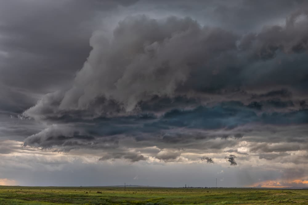 Looming Storm Over Plains by Jun Zuo — canvas wall art