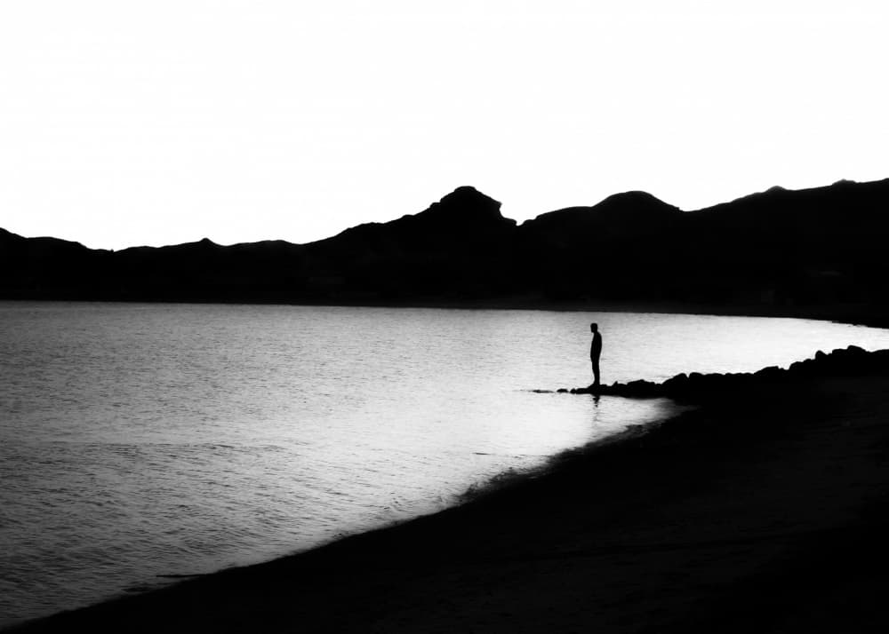 Lone Figure Calm Sea by Hesham Ragab — canvas wall art