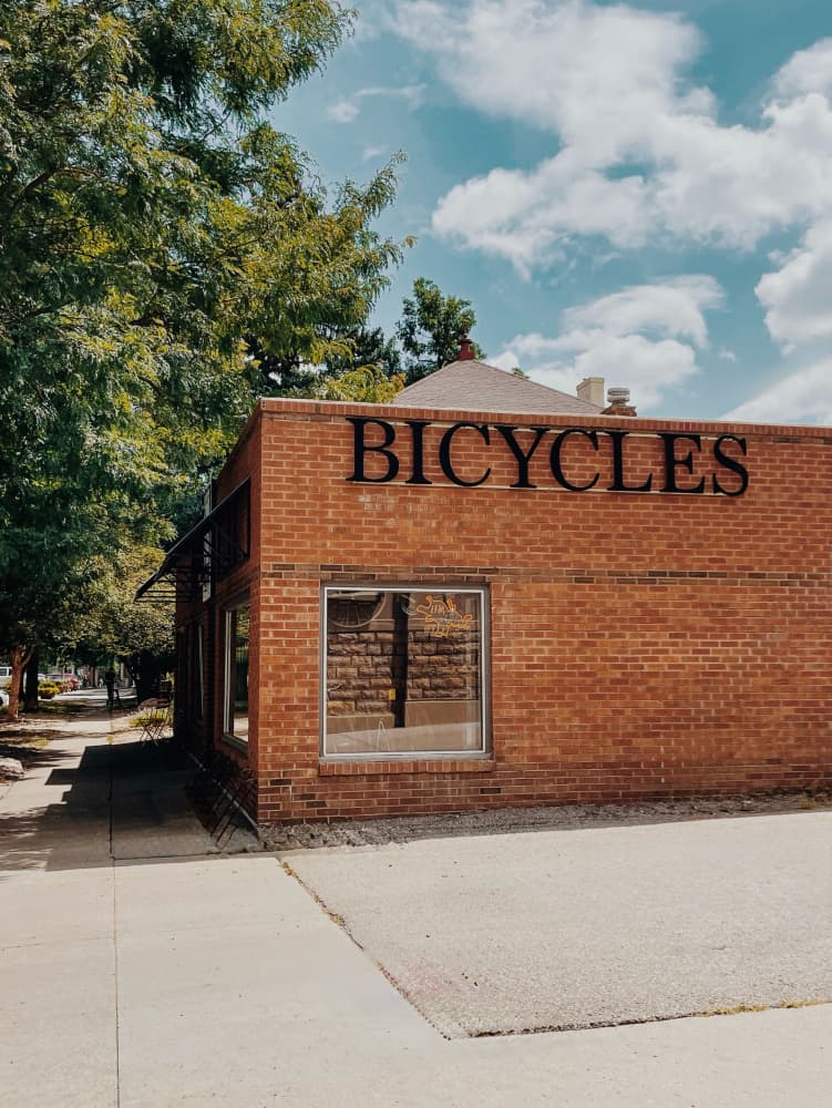 Brick Bicycle Shop by Del Mundo Portraits — canvas wall art