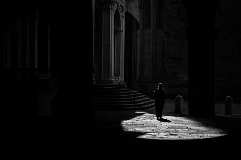 Solitary Figure Dark City by Roberto Marini — canvas wall art