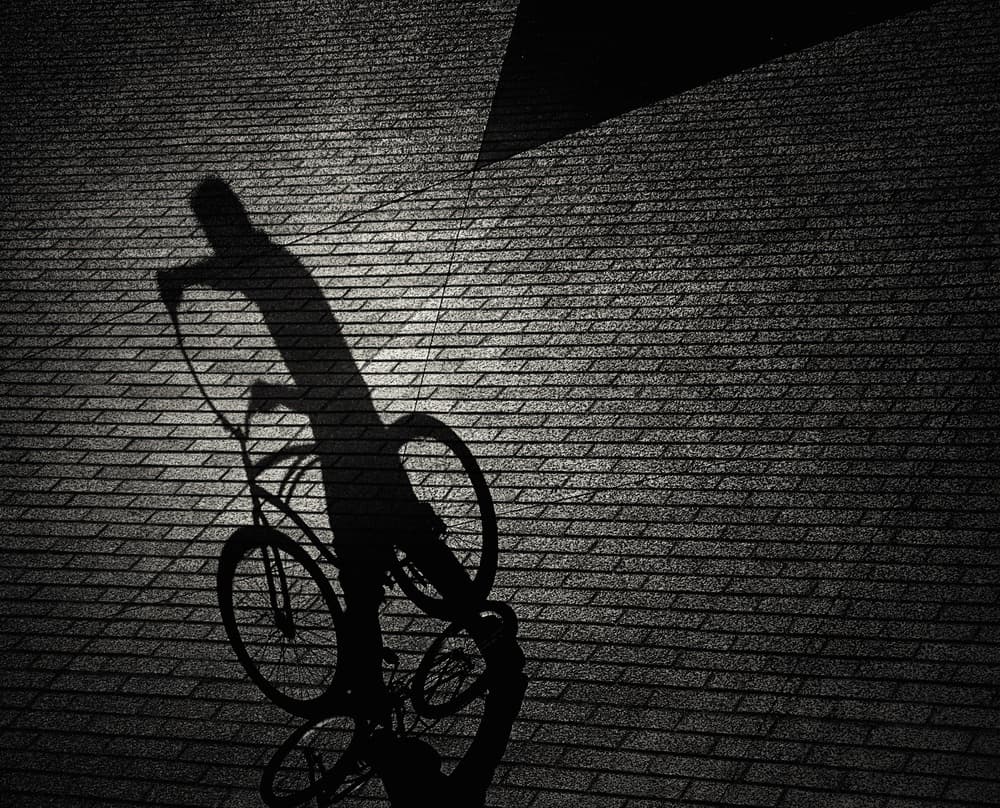 Bike Shadow on Pavement by Roxana Labagnara — canvas wall art