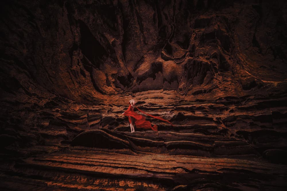 Woman In Red Cavern by KOIKI — canvas wall art
