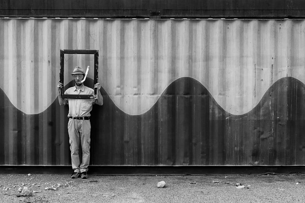 Man Holding Snorkel Frame by Carlo Ferrara — canvas wall art