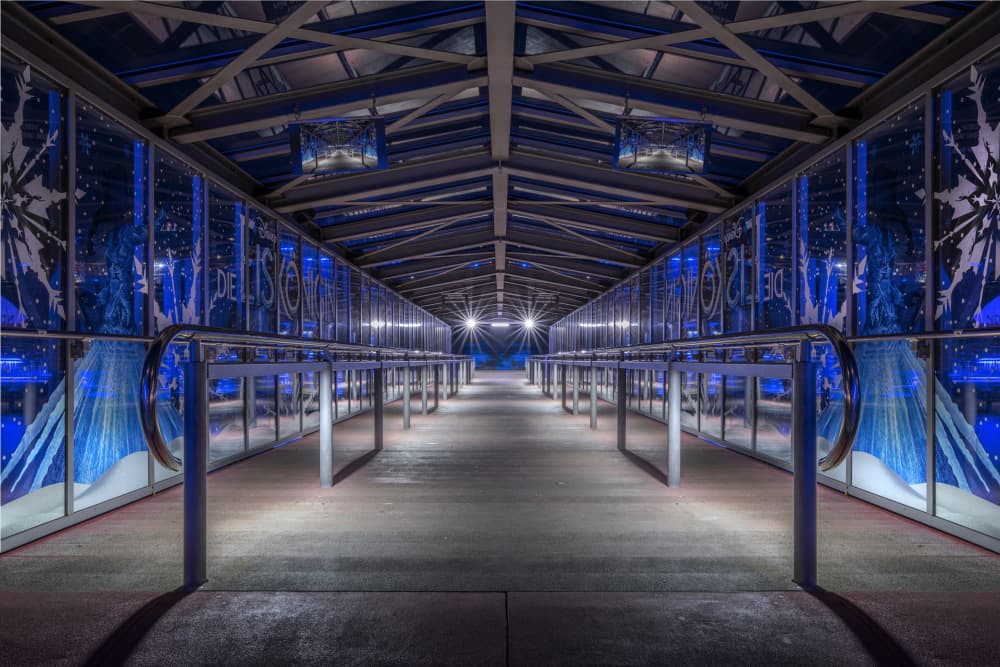 Illuminated Blue Walkway by fotomarion — canvas wall art