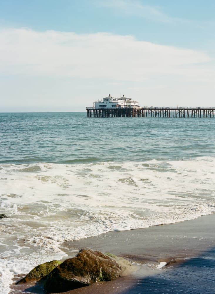 Tranquil Beach Pier by Bethany Young — canvas wall art